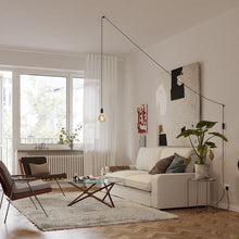 Load image into Gallery viewer, Gaia Plug-In Pendant Light in bedroom.
