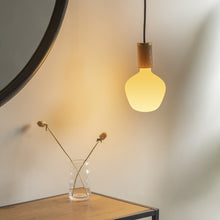 Load image into Gallery viewer, Knuckle Pendant Light in living room.
