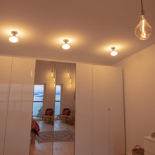 Load image into Gallery viewer, Lochan Oval Outdoor Wall Light in living room.
