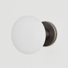 Load image into Gallery viewer, Lochan Oval Outdoor Wall Light in Detail.
