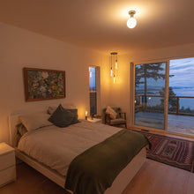 Load image into Gallery viewer, Lochan Sphere III Outdoor Wall Light in bedroom.
