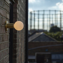 Load image into Gallery viewer, Lochan Wall Light in Outside Area.
