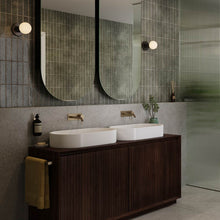 Load image into Gallery viewer, Lochan Wall Light in bathroom.
