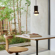 Load image into Gallery viewer, Loop Pendant Light in living room.
