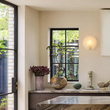 Load image into Gallery viewer, Magma Wall Light in living room.
