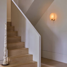 Load image into Gallery viewer, Magma Wall Light in living room.
