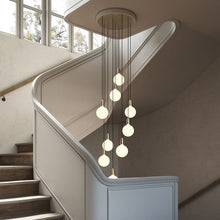 Load image into Gallery viewer, Nine Multi Light Pendant Light in living room.
