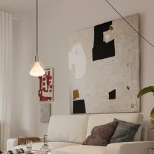 Load image into Gallery viewer, Noma Plug-In Pendant Light in living room.
