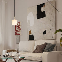 Load image into Gallery viewer, Oblo Plug-In Pendant Light in living room.

