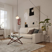 Load image into Gallery viewer, Oval Plug-In Pendant Light in living room.
