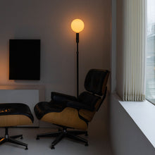 Load image into Gallery viewer, Poise Sphere V LED Adjustable Floor Lamp in living room.
