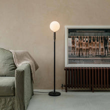 Load image into Gallery viewer, Poise Sphere V LED Adjustable Floor Lamp in living room.

