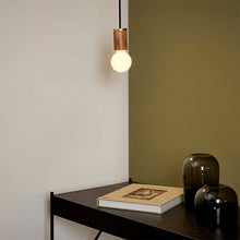 Load image into Gallery viewer, Sphere II Medium Base G24 Type LED Bulb in living room.
