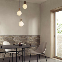 Load image into Gallery viewer, Sphere IV Medium Base G47 Type LED Bulb in living room.
