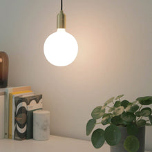Load image into Gallery viewer, Sphere IV Pendant Light in living room.
