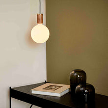 Load image into Gallery viewer, Sphere IV Pendant Light in living room.
