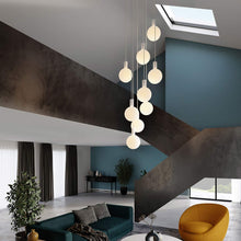 Load image into Gallery viewer, Sphere V Medium Base G63 Type LED Bulb in living room.
