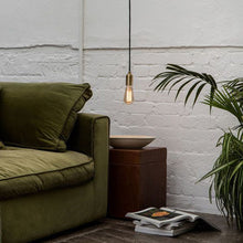 Load image into Gallery viewer, Squirrel Cage Pendant Light in living room.
