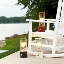 Load image into Gallery viewer, The Muse LED Portable Table Lamp in Outside Area.
