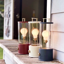 Load image into Gallery viewer, The Muse LED Portable Table Lamp in Outside Area.
