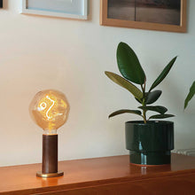 Load image into Gallery viewer, Voronoi I Medium Base G40 Type LED Bulb in living room.
