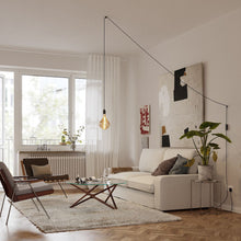 Load image into Gallery viewer, Voronoi II Plug-In Pendant Light in living room.

