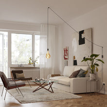 Load image into Gallery viewer, Voronoi III Plug-In Pendant Light in living room.
