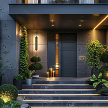 Load image into Gallery viewer, Hvar Outdoor LED Wall Light in Outside Area.
