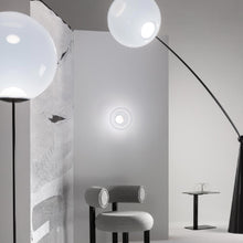 Load image into Gallery viewer, Globe LED Wall Light in living room.
