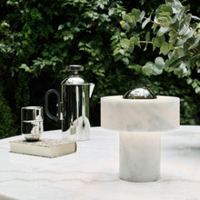 Load image into Gallery viewer, Stone LED Portable Table Lamp in Outside Area.

