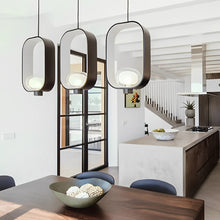 Load image into Gallery viewer, Filipa LED Pendant Light in dining room.
