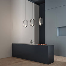 Load image into Gallery viewer, Filipa LED Pendant Light in living room.
