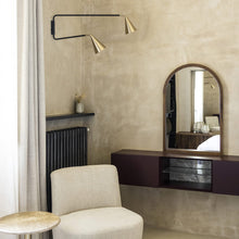 Load image into Gallery viewer, Gordon 2-Light Orientable Wall Light in bedroom.
