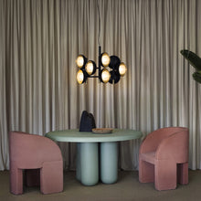 Load image into Gallery viewer, Muse Chandelier in living room.
