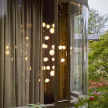 Load image into Gallery viewer, Nabila Chandelier in living room.
