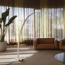 Load image into Gallery viewer, Nastro Big Arc LED Floor Lamp in living room.

