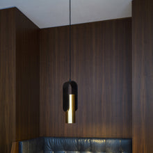 Load image into Gallery viewer, Nastro Orientable Pendant Light in living room.
