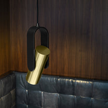 Load image into Gallery viewer, Nastro Orientable Pendant Light in living room.
