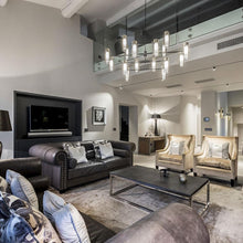 Load image into Gallery viewer, Osman Chandelier in living room.
