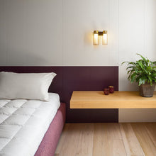 Load image into Gallery viewer, Osman Recessed Wall Light in bedroom.
