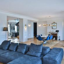 Load image into Gallery viewer, Osman Wall Light in living room.
