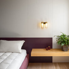 Load image into Gallery viewer, Osman Wall Light in bedroom.
