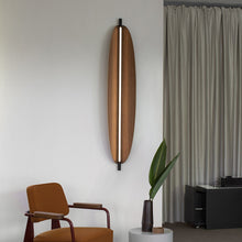 Load image into Gallery viewer, Thula LED Wall Light in living room.
