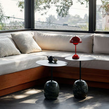 Load image into Gallery viewer, Flowerpot VP9 Portable Table Lamp in living room.
