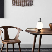 Load image into Gallery viewer, Lucca SC51 LED Table Lamp in living room.
