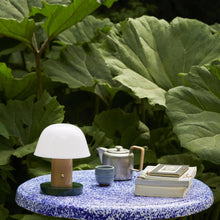 Load image into Gallery viewer, Setago JH27 Portable Table Lamp in Outside Area.
