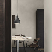 Load image into Gallery viewer, Spinning Pendant Light in dining room.

