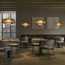 Load image into Gallery viewer, Plisse&#39; LED Pendant Light in restaurant.
