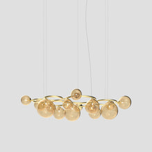 Load image into Gallery viewer, Puppet Ring Pendant Light in Matt Gold/Amber Transparent(72-Inch/15-Light).
