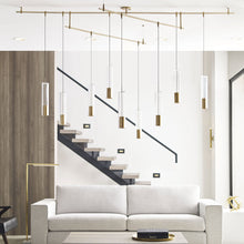 Load image into Gallery viewer, Captra Pendant Light in living room.
